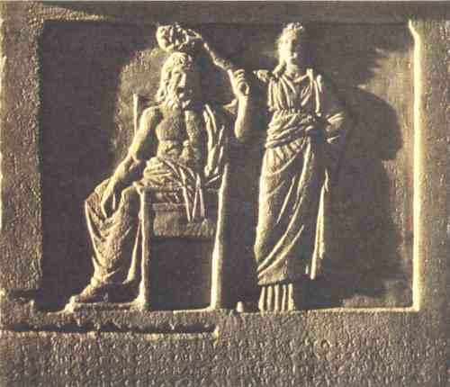 Self-government is honored in a relief showing Democracy placing a wreath on the people of Athens